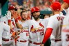 St. Louis Cardinals' Matt Carpenter (13) is congratulated by teammates after scoring a run during the fourth inning of a baseball game against the Pittsburgh Pirates, Friday, Aug. 9, 2019, in St. Louis. (AP Photo/Scott Kane)