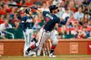 Atlanta Braves' Dansby Swanson follows through on a two-run home run during the eighth inning of a baseball game against the St. Louis Cardinals, Friday, May 24, 2019, in St. Louis. (AP Photo/Scott Kane)