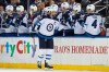 Winnipeg Jets right wing Blake Wheeler (26) is congratulated for his goal during the second period of the team's NHL hockey game against the New York Rangers, Thursday, Oct. 3, 2019, at Madison Square Garden in New York. (AP Photo/Mary Altaffer)