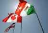 CP
National flags of the United States, Canada, and Mexico fly in the breeze. (Judi Bottoni / The Associated Press files)