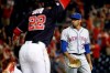New York Mets relief pitcher Edwin Diaz, right, walks off the field as Washington Nationals' Juan Soto scores on Kurt Suzuki's game-winning three-run home run during the ninth inning of a baseball game Tuesday, Sept. 3, 2019, in Washington. Washington won 11-10. (AP Photo/Patrick Semansky)