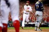 Washington Nationals' Anthony Rendon comes across the plate as Washington Nationals' Juan Soto drives in three runs with a single in the eighth inning to put the Washington Nationals up over the Milwaukee Brewers in a National League wild-card baseball game at Nationals Park, Tuesday, Oct. 1, 2019, in Washington. The Nationals won 4-3. (AP Photo/Andrew Harnik)