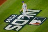 Los Angeles Dodgers starter Rich Hill walks back to the dugout during a pitching change in the third inning in Game 4 of a baseball National League Division Series against the Washington Nationals, Monday, Oct. 7, 2019, in Washington. (AP Photo/Julio Cortez)
