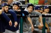 Milwaukee Brewers' Christian Yelich, third from left, sits in the dugout in the fifth inning of a National League wild card baseball game against the Washington Nationals, Tuesday, Oct. 1, 2019, in Washington. (AP Photo/Patrick Semansky)