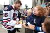 JOHN WOODS / THE CANADIAN PRESS files
Winnipeg Jets forward Blake Wheeler signs autographs for fans after the National Hockey League announced the rosters at a Tim Hortons NHL Heritage Classic press event Aug. 5 at Winnipeg&rsquo;s Portage and Main intersection.