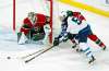 Minnesota Wild goalie Devan Dubnyk, left, defends as Zach Parise breaks up a scoring try by Winnipeg Jets&rsquo; Marko Dano, of Austria, in the first period of an NHL preseason hockey game Saturday, Oct. 8, 2016, in St. Paul, Minn. (AP Photo/Jim Mone)