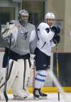 WAYNE GLOWACKI / WINNIPEG FREE PRESS
Manitoba Moose teammates Ondrej Pavelec, left, and Andrew Copp practise at the MTS Iceplex Tuesday.
