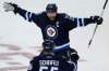 JOHN WOODS / THE CANADIAN PRESS
Winnipeg Jets' Blake Wheeler (26) and Mark Scheifele (55) celebrate Scheifele's game winning goal against the Carolina Hurricanes during overtime NHL action in Winnipeg on Thursday, October 13, 2016.
