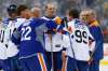 John Woods / The Canadian Press
Former Edmonton Oilers Dave Semenko, centre, and others listen in as captain Wayne Gretzky (99) leads a huddle during a practice for the NHL's Heritage Classic Alumni game in Winnipeg on Friday.