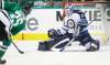 LM Otero / The Associated Press
Dallas&rsquo;s Brett Ritchie opened the scoring Tuesday in Dallas with a shot past Jets goalie Michael Hutchinson in the first period.