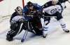 David Zalubowski / The Associated Press
Jets defenceman Jacob Trouba (right) was steady in his return Friday night in Denver, here squeezing out Avs right-winger Rene Bourque in front of Jets goalie Michael Hutchinson.