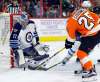 Tom Mihalek / The Associated Press
Winnipeg Jets goalie Connor Hellebuyck defends the goal as Philadelphia Flyers' Nick Cousins attacks during the second period Thursday in Philadelphia.