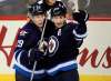 PHIL HOSSACK / WINNIPEG FREE PRESS FILES
Winnipeg Jets Patrik Laine and Mark Scheifele celebrate Scheiflele's goal at the MTS Centre.