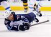 Winslow Townson / The Associated Press Files
Veteran defenceman Toby Enstrom has returned to his native Sweden to attend to an unspecified &ldquo;family situation.&rdquo;