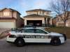 BORIS MINKEVICH / WINNIPEG FREE PRESS
Police outside a house on Kinlock Lane, where two people were sent to hospital Sunday.