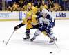 Mark Humphrey / The Associated Press
Winnipeg Jets right-winger Nikolaj Ehlers reaches for the puck as the Nashville Predators&rsquo; Matt Irwin pursues Friday.