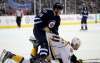 TREVOR HAGAN / THE CANADIAN PRESS 
Winnipeg Jets' Marko Dano (56) stands over Nashville Predators' Mattias Ekholm (14) after taking exception to his hit during the second period of Sunday's game in Winnipeg.