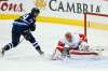 JOHN WOODS / WINNIPEG FREE PRESS
Patrik Laine puts the puck through the five-hole of Detroit Red Wings goaltender Petr Mrazek during the shootout at the MTS Centre Tuesday night.