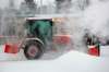 JOE BRYKSA / WINNIPEG FREE PRESS
A tractor blows deep snow from a outdoor rink at Garden City Community Centre on Thursday.