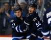 THE CANADIAN PRESS/JOHNS WOODS
Nikolaj Ehlers and Winnipeg Jets' Mark Scheifele, celebrate Scheifele's goal against the New Jersey Devils Tuesday. Ehlers scoring drought has hit 15 games.