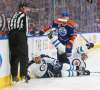 Amber Bracken
/ The Canadian Press
Winnipeg Jets' Dustin Byfuglien (33) and Josh Morrissey (44) fall as Edmonton Oilers' Matthew Benning (83) looks on during first period NHL hockey action in Edmonton, Alta., on Sunday December 11, 2016.