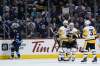 JOHN WOODS / THE CANADIAN PRESS
Winnipeg Jets' Bryan Little skates by as Pittsburgh Penguins' Nick Bonino (13), Jake Guentzel (59) and Mark Streit (32) celebrate Bonino's third goal of the game Wednesday at the MTS Centre.