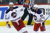 JOHN WOODS / WINNIPEG FREE PRESS
Dustin Byfuglien and Mathieu Perreault celebrate Byfuglien's goal against the Minnesota Wild during the second period Sunday.