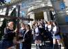 Students Deirdre Beaumont (left to right), Marysa Fosty and Alliah Ramirez hold the cross to be used on Good Friday in front of St. Mary’s Academy. (Wayne Glowacki / Winnipeg Free Press)