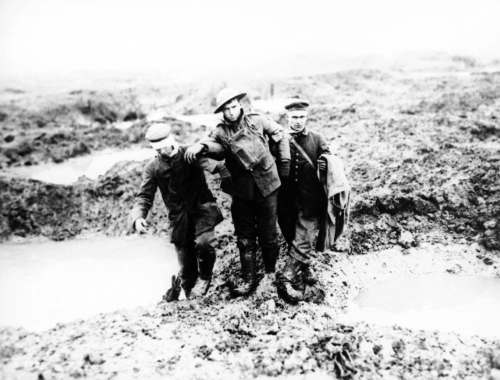 THE ASSOCIATED PRESS FILES
Wounded Canadian and German First World War soldiers help one another through the mud during the Battle of Passchendaele in Belgium in 1917.