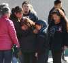 WAYNE GLOWACKI / WINNIPEG FREE PRESS.
Family members comfort Gloria Lebold, centre, grandmother of 23-year-old Cody Severight who was struck and killed by a vehicle on Main Street near Sutherland Ave. at about 8 p.m., Tuesday.