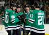 TONY GUTIERREZ / THE ASSOCIATED PRESS
Dallas Stars' Jason Spezza, Remi Elie, John Klingberg and Antoine Roussel celebrate a goal by Elie against the Buffalo Sabres Saturday in Dallas.