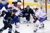 JOHN WOODS / THE CANADIAN PRESS
Winnipeg Jets goaltender Connor Hellebuyck (37) keeps his eye on a rebound as Montreal Canadiens' Phillip Danault (24) and Jeff Petry (26) attempt to score during first period NHL action in Winnipeg Saturday.