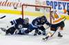 John Woods / The Canadian Press FILES
Winnipeg Jets goaltender Connor Hellebuyck and defenceman Josh Morrissey have helped propel the Jets into a lofty place in the NHL standings with a quarter of the season already gone.