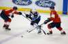 AP Photo/Wilfredo Lee
Winnipeg Jets winger Nikolaj Ehlers drives between two during the second period, Thursday in Sunrise, Fla.