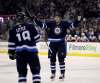 THE CANADIAN PRESS/Trevor Hagan
Winnipeg Jets' Tyler Myers celebrates with Bryan Little after scoring against the Ottawa Senators. After an inury-shortened 2016-2017 season, Myers says 