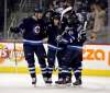 THE CANADIAN PRESS/Trevor Hagan
Winnipeg Jets' Tyler Myers, Bryan Little, Joel Armia and Mathieu Perreault celebrate after Perreault's goal during second period NHL hockey action against the Vancouver Canucks, in Winnipeg, Monday.