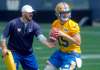 BORIS MINKEVICH / WINNIPEG FREE PRESS FILES
Quarterbacks coach Buck Pierce (left) with quarterback Matt Nichols in the summer.