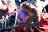 RUTH BONNEVILLE / WINNIPEG FREE PRESS
Thelma Favel, Tina Fontaine's great aunt, embraces her niece, Melena Bittern, while holding a red carnation and eagle feather at the centre of the Oodena Circle during rally for Tina at The Forks Friday.