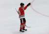 Nam Y. Huh / The Associated Press
Chicago Blackhawks left wing Patrick Sharp waves to the crowd as he is honored on the scoreboard during the third period of an NHL hockey game against the St. Louis Blues, Friday, April 6, 2018, in Chicago.