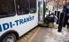 MIKE DEAL / WINNIPEG FREE PRESS
Terry McIntosh, a Handi-Transit user getting on the bus behind the Portage Place in 2016.