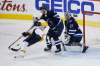 JOHN WOODS / THE CANADIAN PRESS FILES
Jets defenceman Jacob Trouba (centre) greets Predators forward Filip Forsberg on goalie Connor Hellebuyck&rsquo;s doorstep in NHL playoff action last week. Trouba and partner Josh Morrissey are playing key playoff minutes.