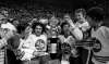 JON THORDARSON / WINNIPEG FREE PRESS / WINNIPEG TRIBUNE FILES
Goaltender Joe Daley (left) and captain Lars-Erik Sjoberg flank the cup.