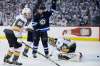 Winnipeg Jets' Paul Stastny (25) celebrates Mark Scheifele's (not shown) goal on Vegas Golden Knights goaltender Marc-Andre Fleury (29) as Nate Schmidt (88) defends during second period of game one action in the NHL Western Conference Final in Winnipeg on Saturday, May 12, 2018. THE CANADIAN PRESS/John Woods