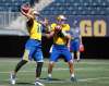 PHIL HOSSACK / WINNIPEG FREE PRESS
Winnipeg Blue Bomber quarterbacks Alex Ross, left and Zack Mahoney throw passes at a team workout Wednesday.