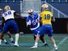 PHIL HOSSACK / WINNIPEG FREE PRESS - Bomber Tristan Okpalaugo (54) closes in on quarterback Alex Ross (18) at a team workout Monday.
