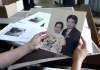 Eduardo Balaquit's wife of 38 years, Lumie, holds a photo of the two of them. (Ruth Bonneville / Winnipeg Free Press)