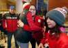 JOHN WOODS / WINNIPEG FREE PRESS FILES
As her father Terrence looks on, Manitoban Brigette Lacquette of Mallard, who won silver in hockey, gets hugs from fans as she arrives home from the winter olympics Feb. 26, 2018.
