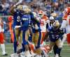 THE CANADIAN PRESS/John Woods
Winnipeg Blue Bombers' Jackson Jeffcoat, Tristan Okpalaugo and Adam Bighill celebrate the sack of BC Lions quarterback Jonathon Jennings during CFL action in Winnipeg Saturday.