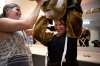 Photos by ANDREW RYAN / WINNIPEG FREE PRESS
Free Press columnist Jen Zoratti receives some help putting on the Folklorama Llama costume.