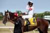 Rico Walcott riding Sky Promise wins the 70th running of the Manitoba Derby at Assiniboia Downs Monday. (John Woods / Winnipeg Free Press)